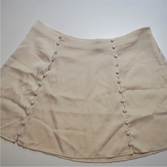 Urban Outfitters cream mini skirt with front button details - size large - Picture 9 of 11